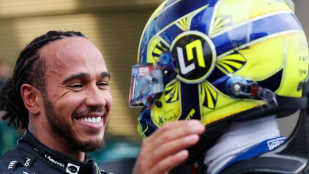 120701224_lewishamiltonandlandonorris.jpg